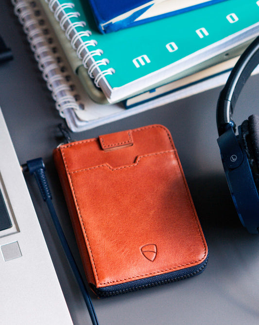 Discover why a slim leather zipper wallet outperforms bulky billfolds.
