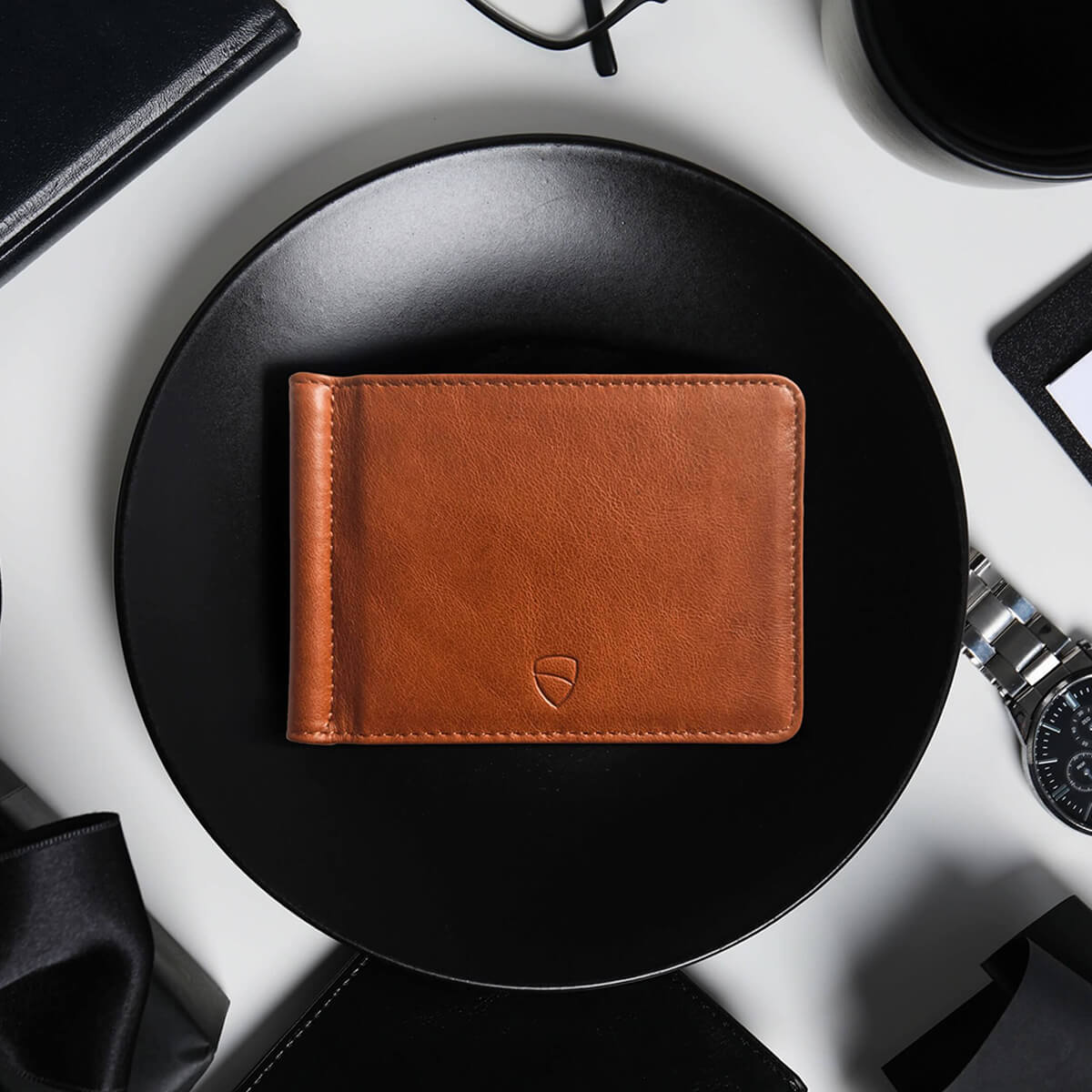 Vaultskin BROMPTON cognac leather wallet showing slim profile and fine stitching – RFID-protected minimalist design for modern professionals